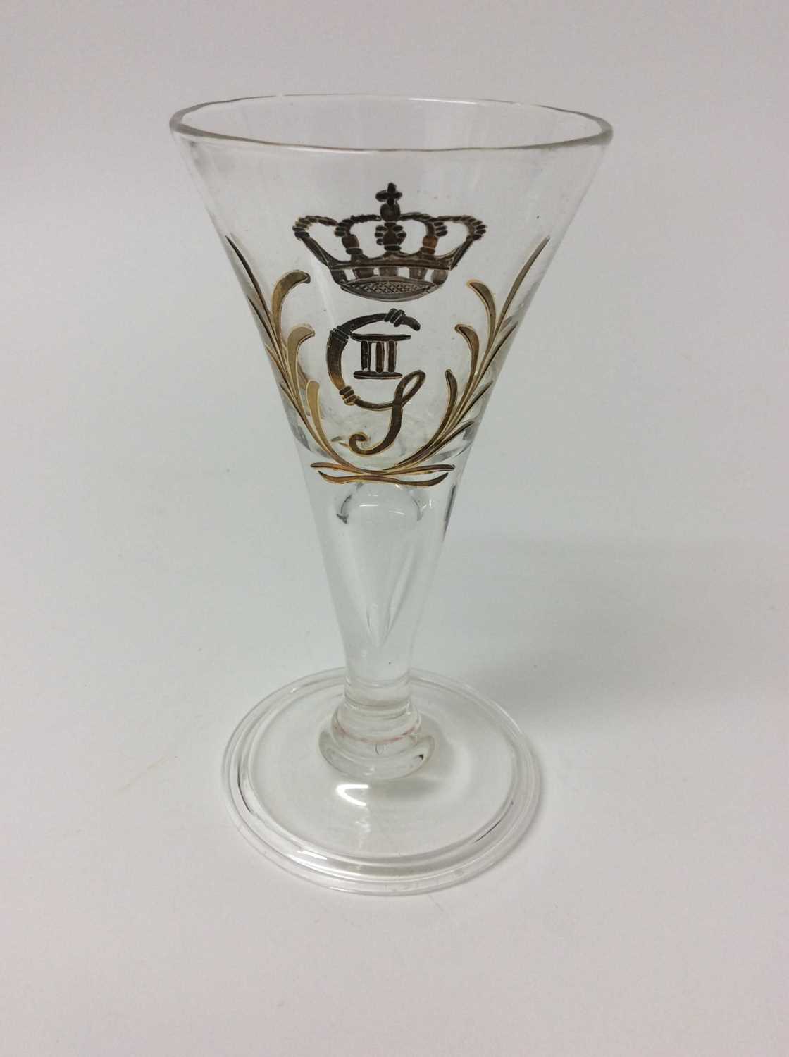 Lot 9 - Eighteenth century -style wine glass boldly engraved and gilded with the cipher of King Gustav III of Sweden , of trumpet form with air bubble to stem raised on bell-shaped folded foot 16 cm high