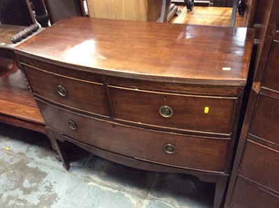 Lot 1006 - Antique mahogany bow front chest of two short and one long drawer on square taper legs