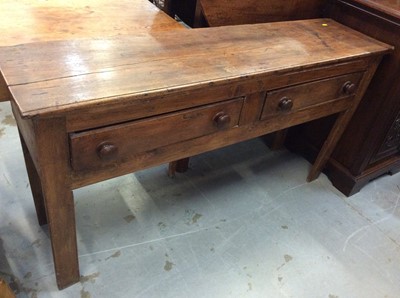 Lot 953 - Early 19th century elm dresser base with two drawers with tuned bun handles on plain legs