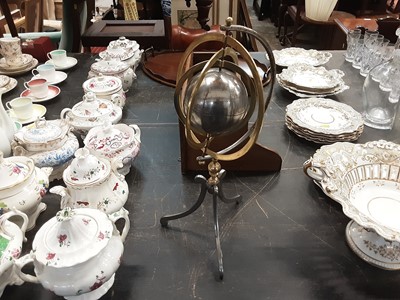 Lot 171 - Late Victorian brass oil lamp with glass shade, brass and steel planeterium/model, Edwardian inlaid mahogany oval tray and a hanging shelf