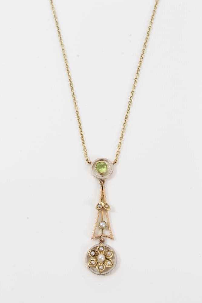 Lot 204 - Edwardian 15ct gold peridot and seed pearl pendant on chain