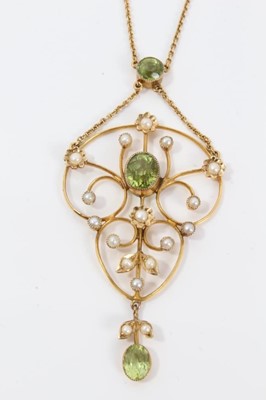 Lot 205 - Edwardian 9ct gold peridot and seed pearl pendant on chain