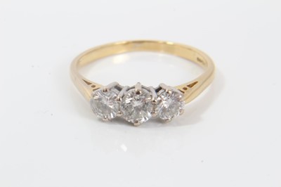 Lot 210 - Diamond three stone ring with three round brilliant cut diamonds estimated to weigh approximately 1.00ct in total on 18ct gold shank