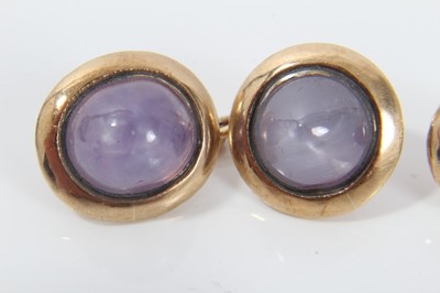Lot 212 - Pair of gold and pink cabochon stone cufflinks