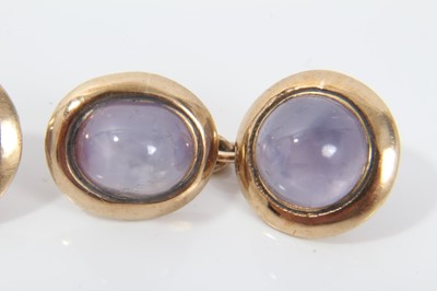 Lot 212 - Pair of gold and pink cabochon stone cufflinks