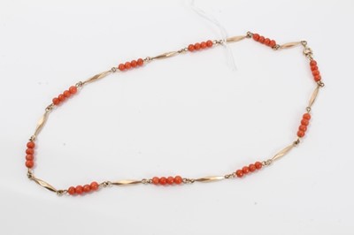 Lot 308 - 9ct gold and coral bead necklace