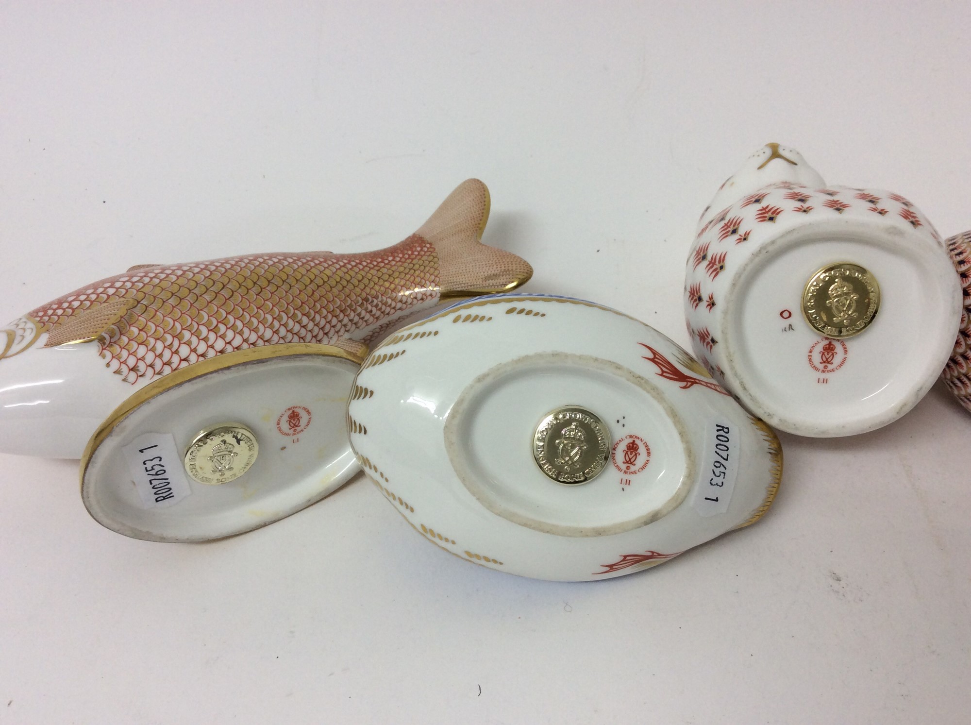 Lot 250 Five Royal Crown Derby paperweights, three