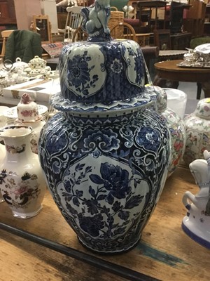 Lot 53 - Large Delft pottery blue and white vase and cover and two Chinese porcelain ginger jars