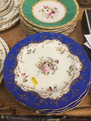 Lot 51 - Seventeen Victorian porcelain dessert plates with polychrome painted floral decoration on green ground together with a set of six Victorian porcelain dessert plates with hand painted floral decorat...