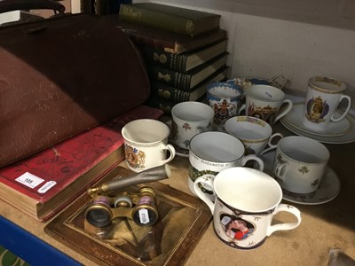 Lot 105 - Collection of Royal Commemorative china, leather Gladstone bag, brass and enamel opera glasses, books and sundries