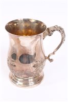 Lot 534 - Large 19th century white metal mug of baluster...