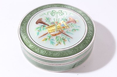 Lot 174 - Early 20th Continental silver and green guilloché enamel box of circular form with white border and removable push fit cover decorated with musical instruments amongst foliate swags