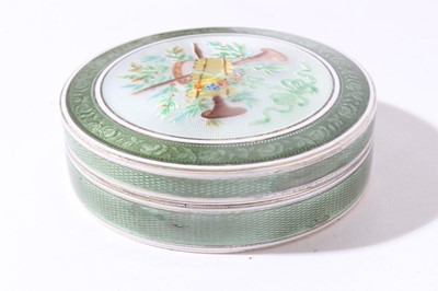 Lot 174 - Early 20th Continental silver and green guilloché enamel box of circular form with white border and removable push fit cover decorated with musical instruments amongst foliate swags