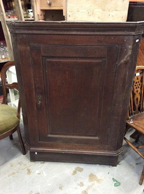 Lot 1021 - Georgian oak corner cupboard