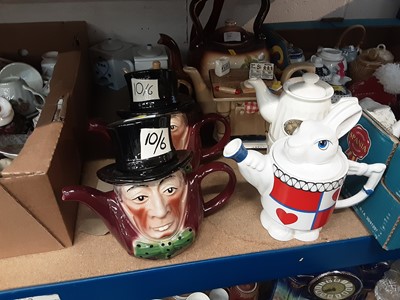 Lot 154 - Collection of ceramic teapots to include novelty Tony Wood 'Mad Hatter' teapots, Wade Alice in Wonderland's 'White Rabbit' teapot, other novelty teapots and others