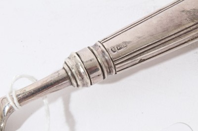 Lot 158 - George III silver fish slice with curved pierced blade and brite cut engraved decoration (London 1800), together with another similar (London 1787), 31 and 30cm in length (2)