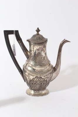 Lot 173 - 19th century white metal coffee pot of oval baluster form with engraved and chased decoration and angular ebony handle, marked with a crowned letter L and 'L.S' to foot rim