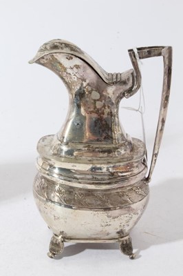 Lot 173 - 19th century white metal coffee pot of oval baluster form with engraved and chased decoration and angular ebony handle, marked with a crowned letter L and 'L.S' to foot rim