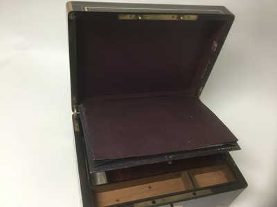 Lot 36 - Early Victorian brass mounted coromandel work box