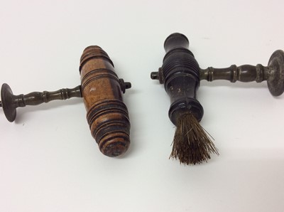 Lot 187 - Two 19th century corkscrews with turned wooden handles, one with brush
