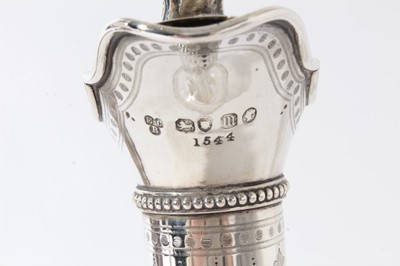 Lot 127 - Victorian silver mounted glass claret jug of onion form with star cut base, wheel engraved and etched decoration, faceted neck and silver mounts with engraved decoration