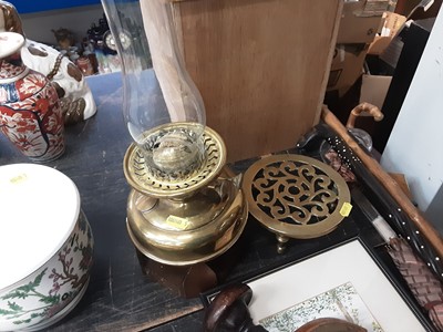 Lot 179 - Edwardian brass oil lamp, brass trivet, two watercolours and vintage walking sticks and parasols/umbrellas