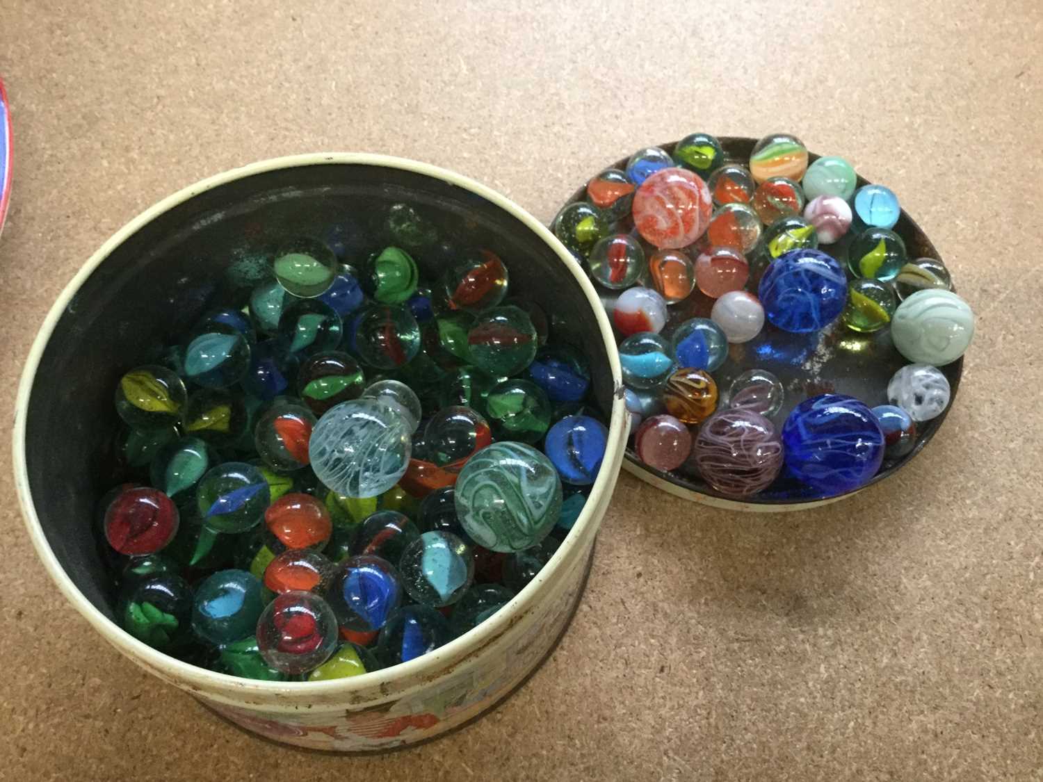 Lot 326 - Tin containing a quantity of vintage marbles