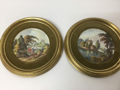 Lot 160 - Pair of early 19th century framed Crown Derby plaques, painted with titled scenes - 'In Italy' and 'In Holland' - probably cut down from plates, measuring 12.5cm diameter excluding frames