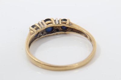 Lot 257 - 18ct gold diamond and sapphire ring
