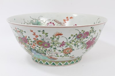 Lot 121 - Large 20th century Chinese porcelain bowl, the inside painted with fish swimming amongst weeds and flowers, the outside with flowers, six-character Kangxi mark in iron red to base, 41cm diameter