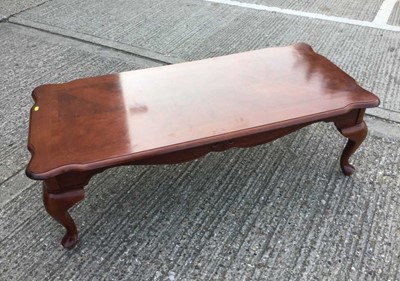 Lot 933 - Reproduction hardwood coffee table of rectangular form with cabriole legs