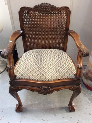 Lot 980 - 1920s mahogany open elbow chair with caned back, on carved claw and ball feet