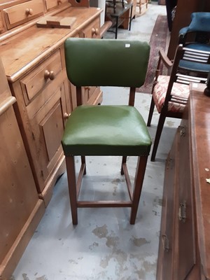 Lot 1061 - Set of four bar stools with green upholstered seats and backs