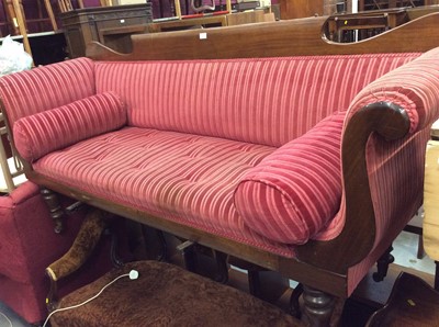 Lot 957 - Late Victorian mahogany framed scroll end sofa with red velvet upholstery, on turned legs