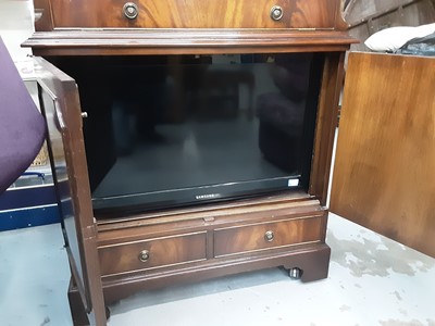 Lot 5 - Samsung flatscreen television contained in a mahogany television cabinet