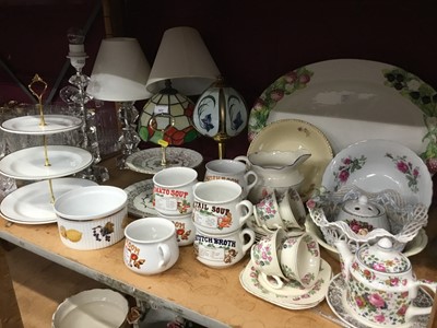 Lot 521 - Two shelves of china and glassware to include collectors plates, and Tiffany style table lamp