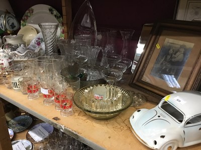 Lot 525 - Two shelves of glassware, pictures and sundries