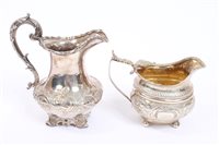 Lot 566 - Late William IV silver cream jug of baluster...