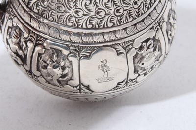 Lot 48 - Victorian silver Indian Mughal style milk / cream jug embossed with nine signs of the Zodiac, each within a scrolled panel, (London 1877) maker Alexander Macrae, 3.5oz, 9cm in height