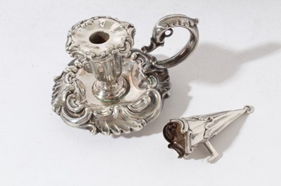 Lot 157 - Victorian silver inkstand of oval form, with shell, scroll and leaf border, central chamberstick with snuffer and a pair of cut glass inkwells with silver mounts, on four scroll feet (London 1891)