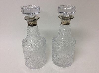 Lot 210 - Pair of silver mounted and cut glass decanters