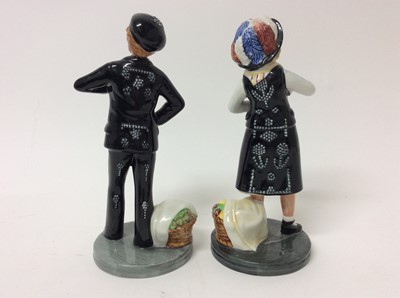 Lot 597 - Pair of Royal Doulton Pearly Girl and Boy figures