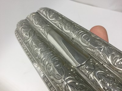 Lot 96 - Victorian silver cigar case of rectangular form with shaped corners, engraved foliate decoration, silver gilt interior and folding clasp, (Birmingham 1859), maker Aston & Son