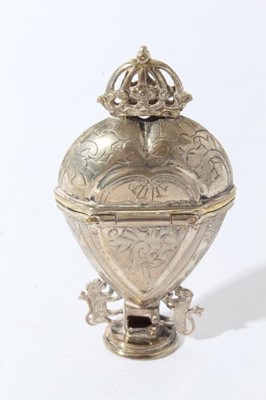 Lot 87 - Victorian silver trinket box of triangular form with embossed decoration (London 1885), together with a silver vesta case and a 19th century Continental white metal