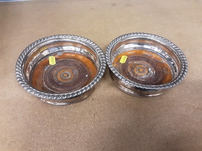 Lot 147 - Pair of 19th century silver plated wine coasters