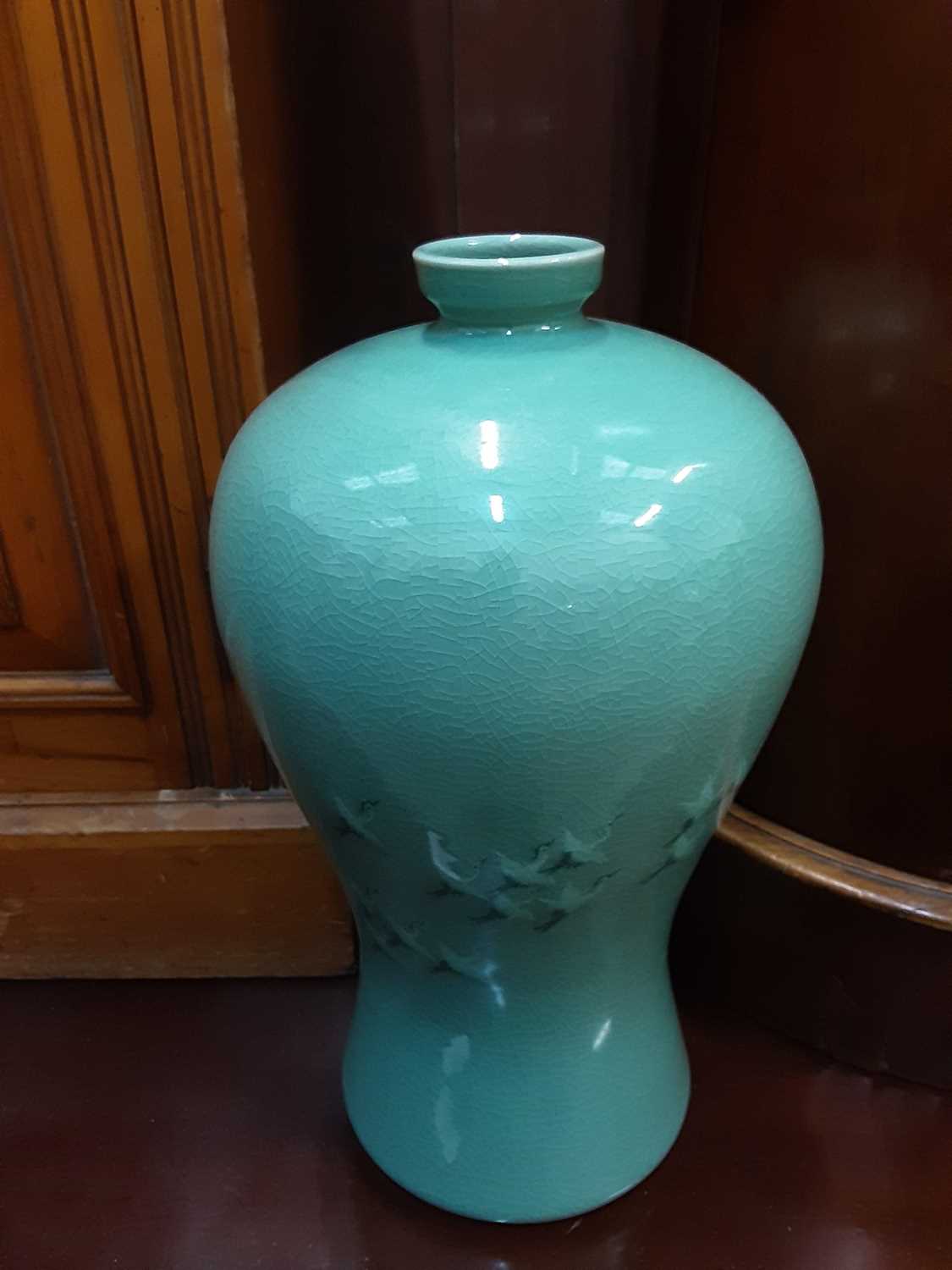 Lot 164 - Three Korean celadon porcelain vases with certificates