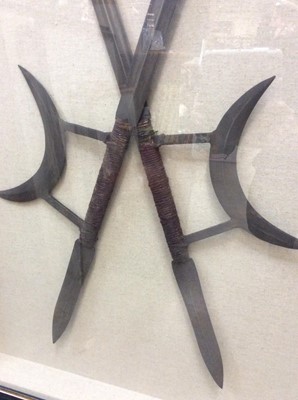 Lot 429 - Two Chinese replica KonFu steel weapons mounted in glazed box frame