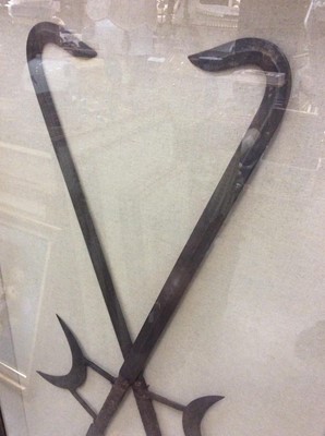 Lot 429 - Two Chinese replica KonFu steel weapons mounted in glazed box frame