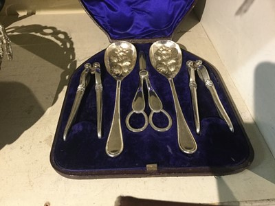 Lot 242 - Victorian electrotype together with a good quality silver plated fruit servers and nut crackers in fitted case (2)