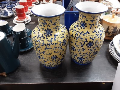 Lot 159 - Pair of Yellow glazed Chinese Vases with drilled based